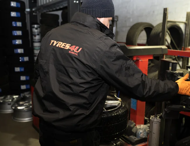 Tyres 4 U jacket with machine