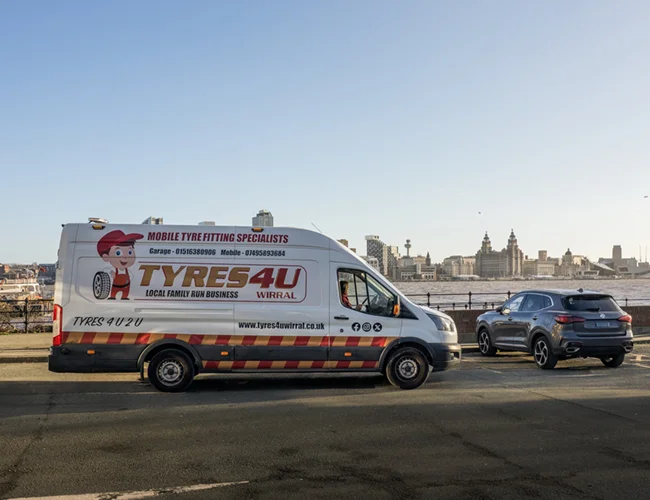 Van with Liverpool skyline